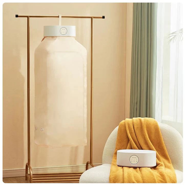 Trending Height electric clothes drying machine with beige drying bag and white control unit in modern room