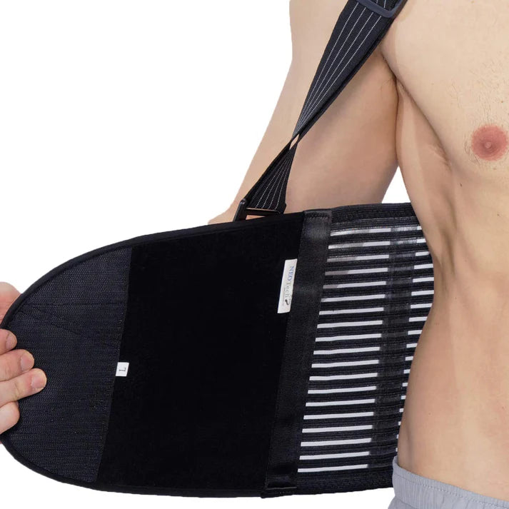 Trending Height lower back pain relief brace being worn and adjusted on a male torso with elastic support straps