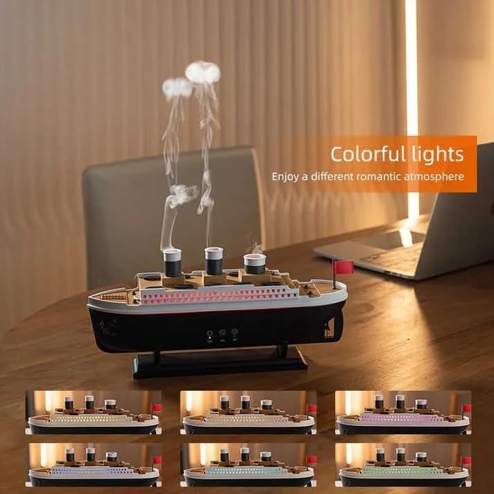 Titanic ship humidifier diffuser with colorful lights releasing vapor on wooden desk near laptop