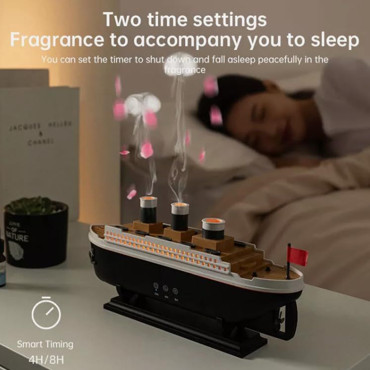 Titanic ship humidifier diffuser releasing mist with timer settings next to a sleeping person