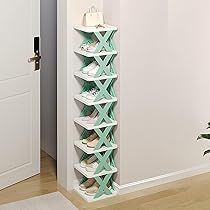 TRENDING HEIGHT white and green x shaped shoe rack with multiple shelves holding shoes in a corner